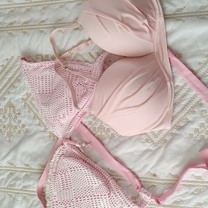 Two pale pink bikini tops